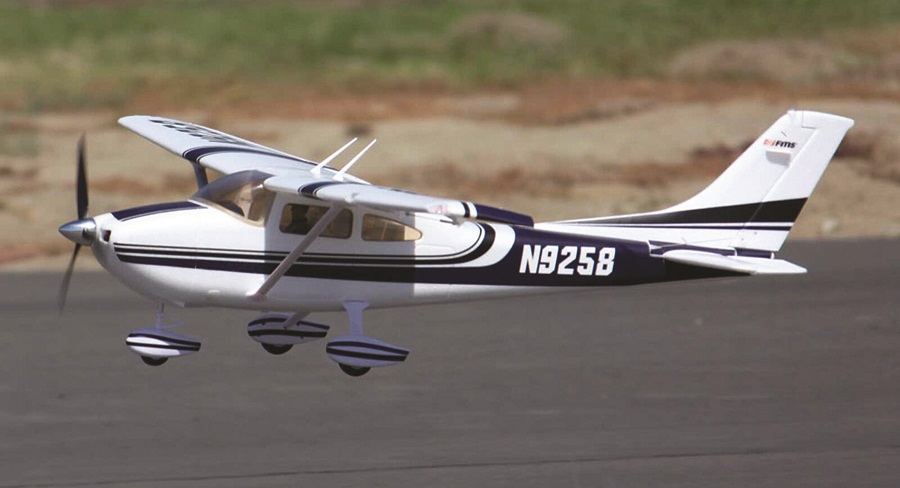 A high-wing airplane with a flight stabilization system, like this FMS Sky Trainer 182 PNP with Reflex, is an ideal intermediate trainer.