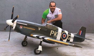 Fernando shows off his beautiful B-Model Mustang, bashed from a Top Flite kit.