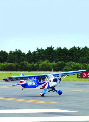 A perfectly trimmed aircraft boils down to the proper setup. Here, Jack Buckley’s beautiful clipped-wing Cub performs a touch-and-go.