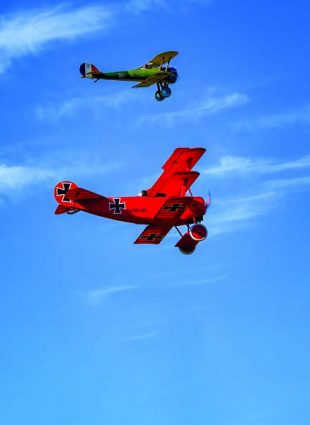 Chad Cotsamire's Dr.1 and Kenny Hurtado's Nieuport enjoy a friendly sortie.