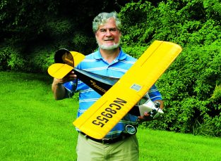 Designer Richard Dery shows off the nicely detailed Monocoupe. It makes a great first building project.