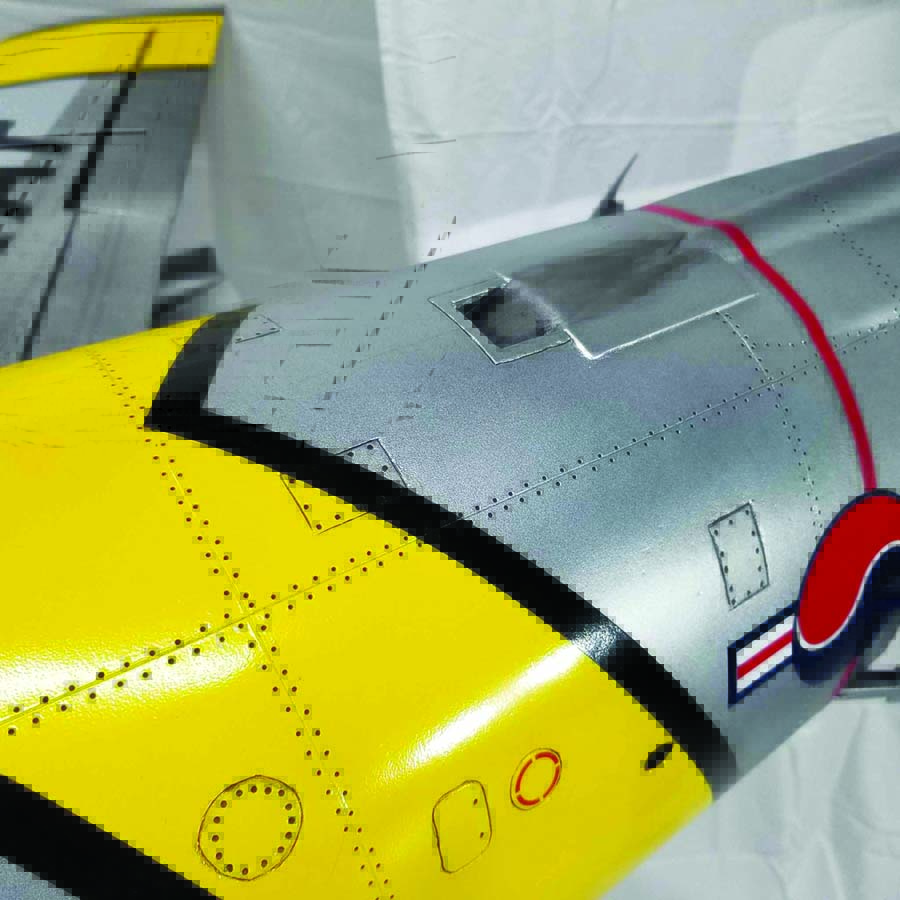 Rivets, panel lines, and weathering details bring a model aircraft to life.