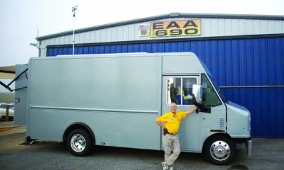 Bryan Kennedy strikes a pose with Skylab II, his customized RC plane hauler and workshop.