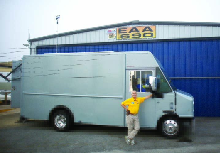 Bryan Kennedy strikes a pose with Skylab II, his customized RC plane hauler and workshop.
