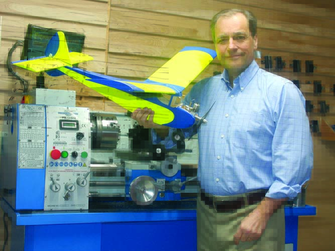 Jim Mullner in the workshop with his Tomboy, which is powered by his scratch-built 1cc Weaver diesel engine.