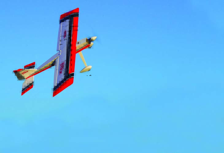 The 60-inch-span Hangar Ultra Stick 10cc ARF is designed to fly on an electric motor (right), a glow engine (opposite page left) and even a radial gas engine (opposite page right). Each power system would give the aerobat a unique personality and flight characteristics.